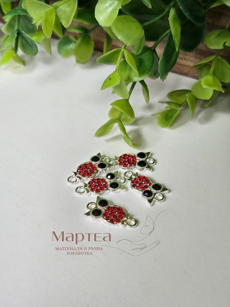 Свързващ елемент във форма на бухал с кристали