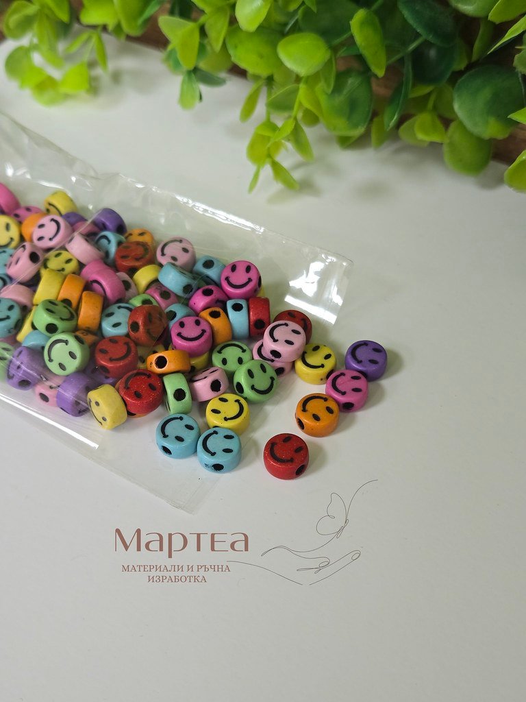 smiley faced beads in different colours